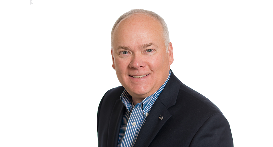 Headshot of John Rademacher on white background